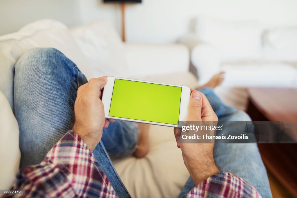 Man holding a smart phone