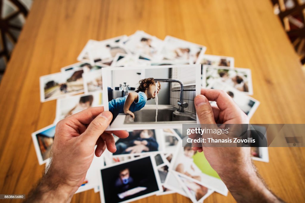 Man holding a photo