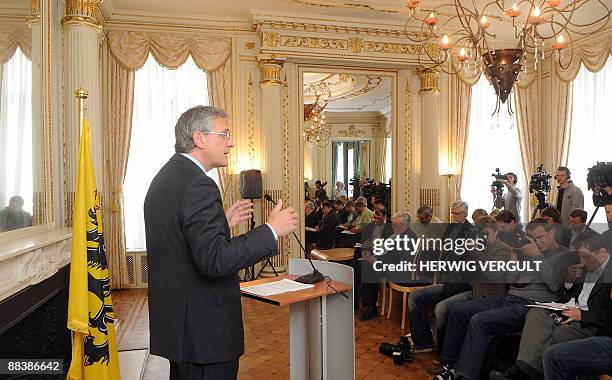 Outgoing leader of the Flanders regional government Kris Peeters speaks at a press conference on June 10, 2009 in Brussels. Peeters, who party CD&V...
