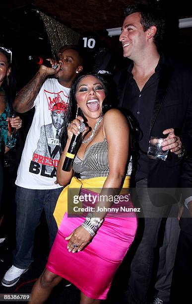 Lil' Kim and Mark Birnbaum attend Eugene Remm and Mark Birnbaum's joint birthday party at Tenjune on June 9, 2009 in New York City.