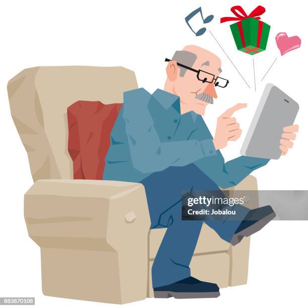 senior man using digital tablet - senior reading stock illustrations