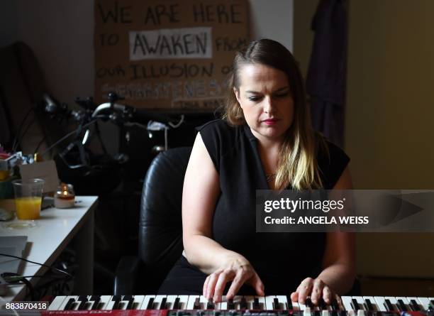 Musician Pauline Pisano poses for a picture on November 14, 2017 in New York. Taking her often deeply personal songs to clubs around the United...