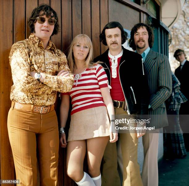 Eric McCredie, Sally Carr, Ken Andrew and Ian McCredie of the pop group Middle of The Road pose for a group shot in Hyde Park in 1972 in London.