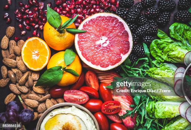 healthy vegan snack board pink grapefruit - fruits and vegetables ストックフォトと画像