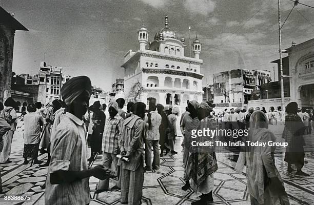 Devotees at the Golden Temple after the operation was over in 1984 in Amritsar, India.