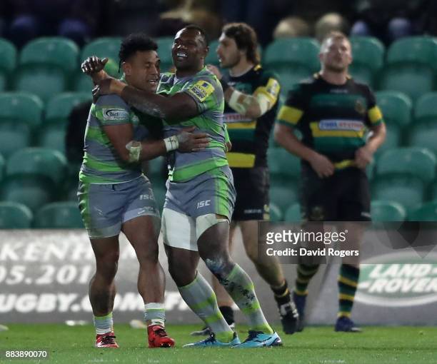 Sonatane Takulua of Newcastle celebrates with team mate Vereniki Goneva after winning the match with the last kick of the match with a conversion...