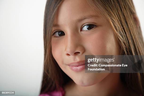 portrait of brown eyed girl - brown eyed girls stock pictures, royalty-free photos & images