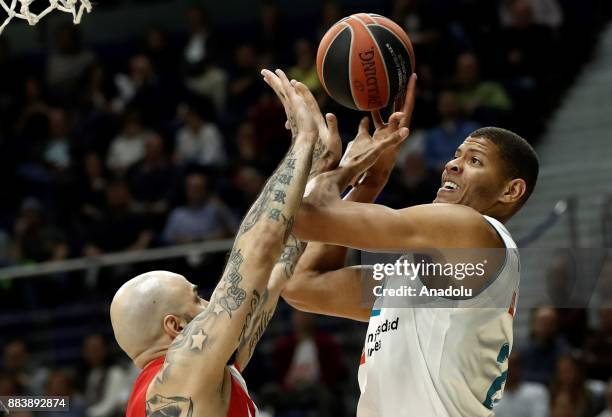 Edy Tavares of Real Madrid in action against Pero Antic of Crvena Zvezda during the Turkish Airlines Euroleague match between Real Madrid and Crvena...