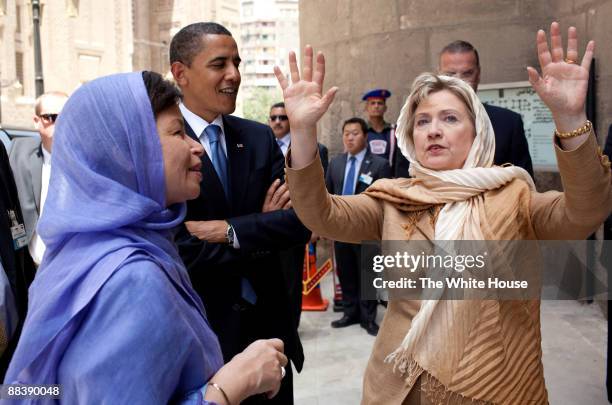 In this photo provided by The White House, President Barack Obama, Senior Advisor Valerie Jarrett , and Secretary of State Hillary Clinton tour the...