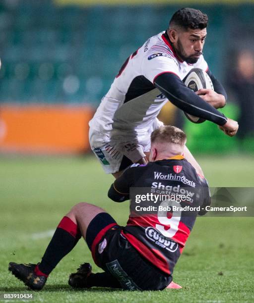 Ulster's Charles Piutau is tackled by Dragons' Dan Babos during the Guinness Pro14 Round 10 match between Dragons and Ulster Rugby at Rodney Parade...