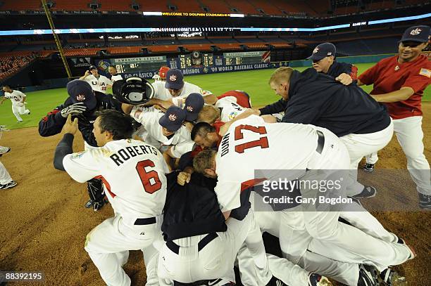 Team USA rush the field in celebration during the Pool 2 Game 5, of the second round of the 2009 World Baseball Classic at Dolphin Stadium in Miami,...