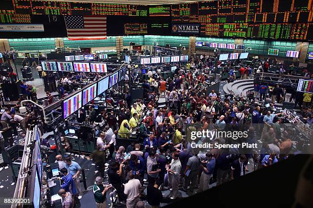 Traders in crude oil and natural gas options work on the floor of the New York Mercantile Exchange on June 10, 2009 in New York City. Crude futures...