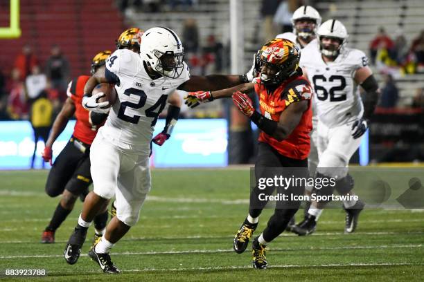 Penn State Nittany Lions running back Miles Sanders stiff arms Maryland Terrapins defensive back Darnell Savage Jr. On November 25 at Capital One...