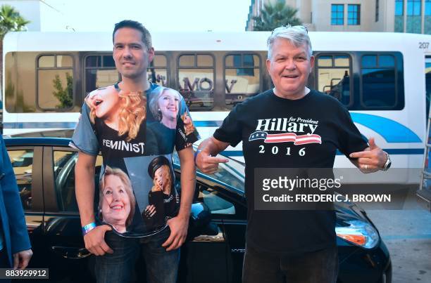 Supporters of Hillary Clinton, Jerry Hudson and Mark Delfin wait at the front of the line to enter Vroman's Bookstore in Pasadena, California on...