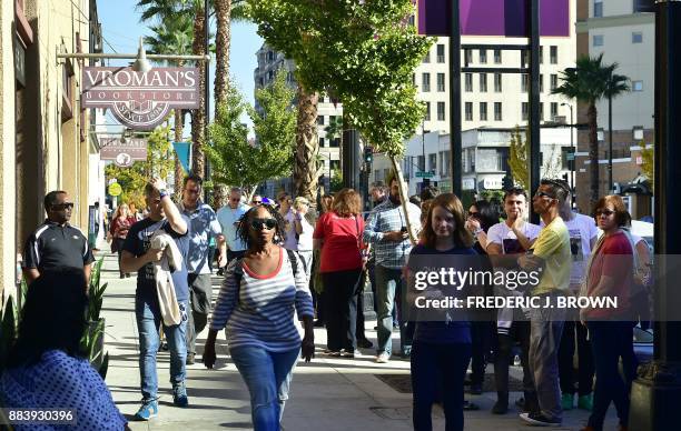 Supporters of Hillary Clinton wait in line to enter Vroman's Bookstore in Pasadena, California on December 1 to get a signed copy of Clinton's book...