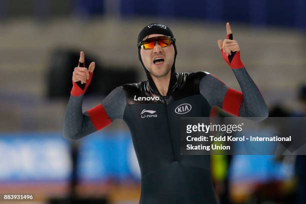 Vincent De Haitre of Canada celebrates after his team set the new world record in the men's team sprint race during the ISU World Cup Speed Skating...