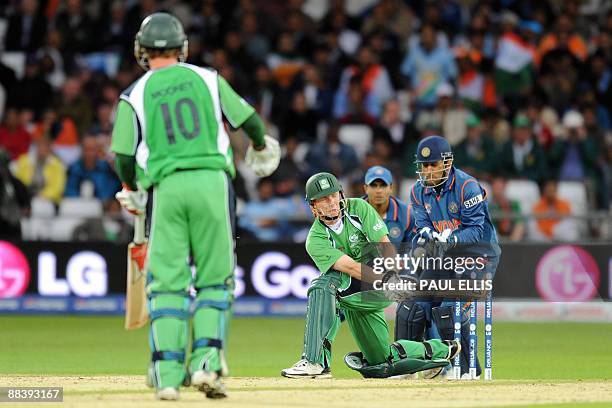 Ireland's Andrew White plays a shot during the ICC World Twenty 20 cricket match against India at Trent Bridge, Nottingham, England on June 10, 2009....