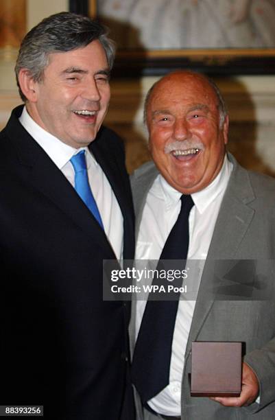 Jimmy Greaves smiles after collecting his medal presented by Prime Minister Gordon Brown for representing his country in the 1966 World Cup at...