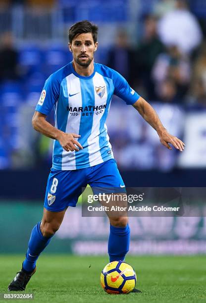 Adrian Gonzalez of Malaga CF in action during the La Liga match between Malaga and Levante at Estadio La Rosaleda on December 1, 2017 in Malaga,...