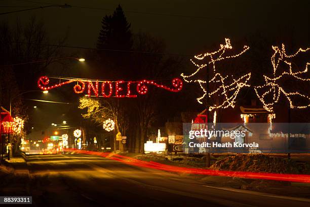 christmas lights and light trails. - whitefish foto e immagini stock