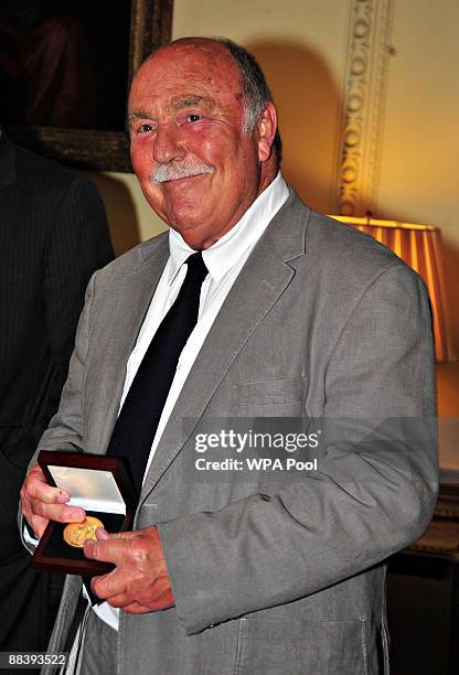 Jimmy Greaves smiles after collecting his medal presented by Prime Minister Gordon Brown for representing his country in the 1966 World Cup at...