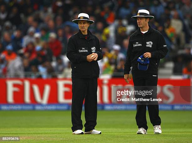 Umpire Simon Taufel and Umpire Billy Bowden confer during the ICC World Twenty20 match between West Indies and Sri Lanka at Trent Bridge on June 10,...