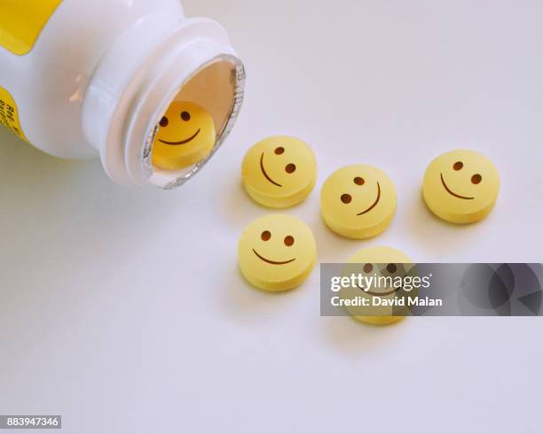 smiley faced pills. - antidepressants stockfoto's en -beelden