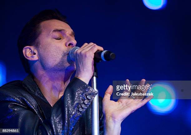 Singer Dave Gahan of the English pop band Depeche Mode performs live during a concert at the Olympiastadion on June 10, 2009 in Berlin, Germany. The...
