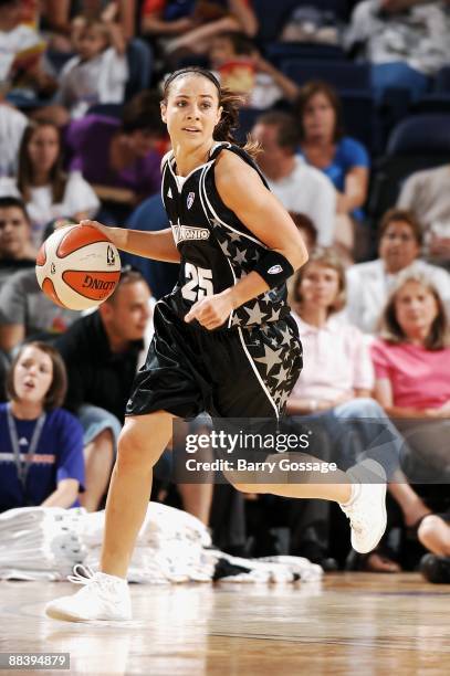 Becky Hammon of the San Antonio Silver Stars drives the ball up court during the WNBA game against the Phoenix Mercury on June 6, 2008 at US Airways...