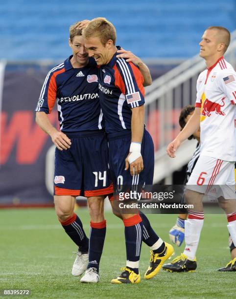 June 7: Steve Ralston congratulates teammate Taylor Twellman of the New England Revolution on his second goal of the match against the New York Red...