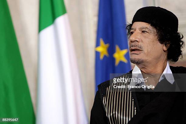 Libya's leader Muammar Gaddafi attends a meeting with Italian Prime Minister Silvio Berlusconi at Villa Madama on June 10, 2009 in Rome, Italy....