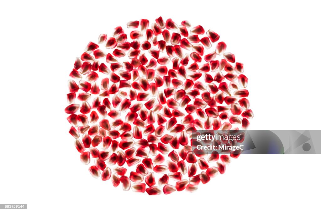 Pomegranate Seeds on White