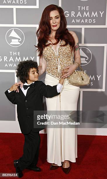 Tomi Rae Hynie, widow of James Brown , and son James Brown Jr.