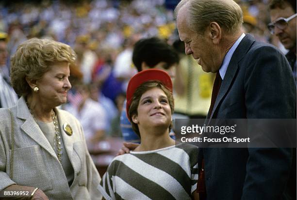 President Gerald Ford and First Lady Betty Ford with Marry Lou Retton before the World Series at Tiger Stadium in Detroit, Michigan. The Tigers won...