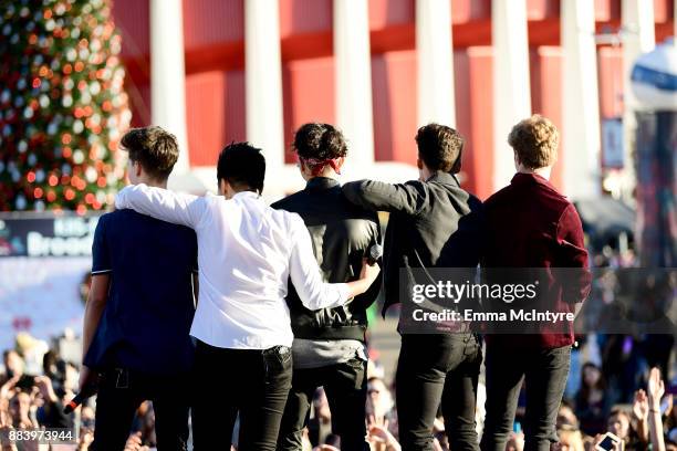 Michael Conor, Sergio Calderon, Drew Ramos, Chance Perez and Brady Tutton of In Real Life perform onstage at 102.7 KIIS FM's Jingle Ball Village at...