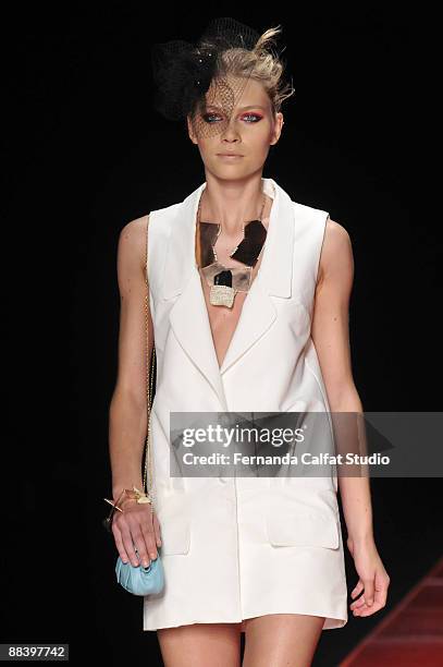 Model Aline Weber displays a design by Juliana Jabour during the last day of Fashion Rio at Pier Maua on June 10, 2009 in Rio de Janeiro, Brazil.