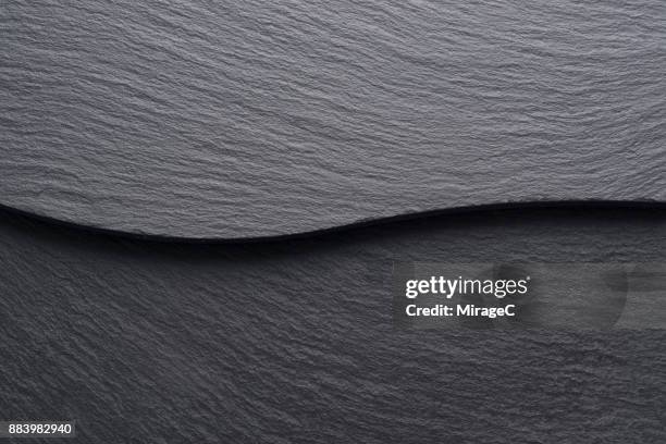 black slate board stacking - grey slate stockfoto's en -beelden