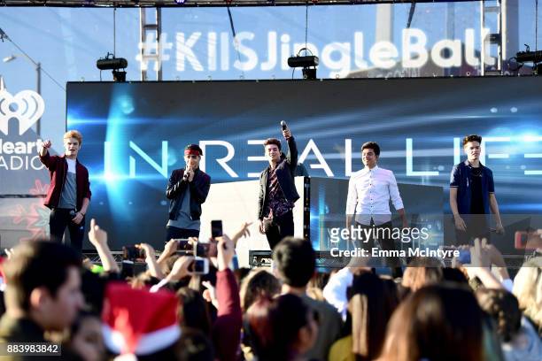 Brady Tutton, Drew Ramos, Chance Perez, Sergio Calderon and Michael Conor of In Real Life perform onstage at 102.7 KIIS FM's Jingle Ball Village at...