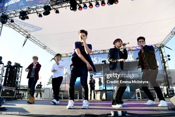 Brady Tutton, Sergio Calderon, Michael Conor, Drew Ramos and Chance Perez of In Real Life perform on stage at 102.7 KIIS FM's Jingle Ball Village at...