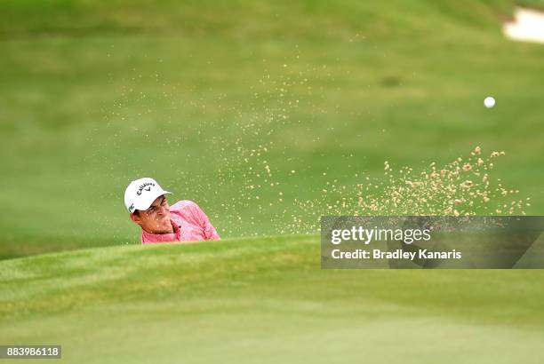 Jack Munro of Australia plays a shot out of the bunker on the 8th hole during day three of the 2017 Australian PGA Championship at Royal Pines Resort...