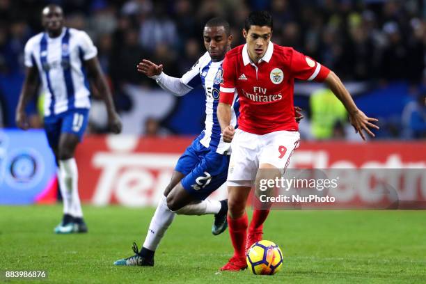 Benfica's Mexican forward Raul Jimenez in action with Porto's Portuguese defender Ricardo Pereira during the Premier League 2016/17 match between FC...