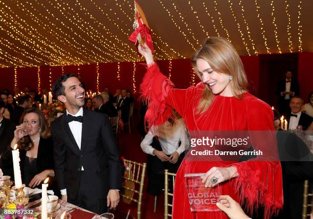 Oxfordshire, ENGLAND Imran Amed and Natalia Vodianova with her Global VOICES 2017 Award at the gala dinner during #BoFVOICES on December 1, 2017 in...