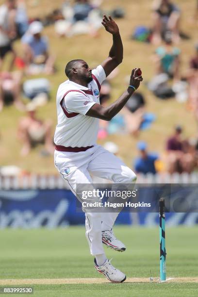 Jason Holder of the West Indies bowls during day two of the Test match series between New Zealand Blackcaps and the West Indies at Basin Reserve on...