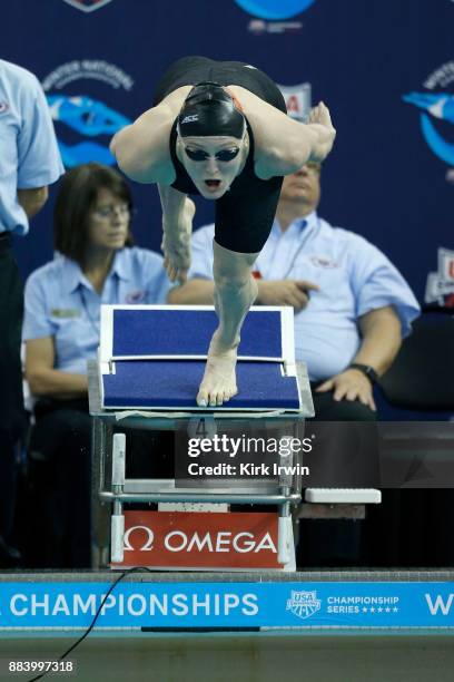 Kelsi Worrell of Cardinal Aquatics leaves the blocks during the A-Finals of the women's 100 yard butterfly during day 3 of the 2017 Swimming Winter...