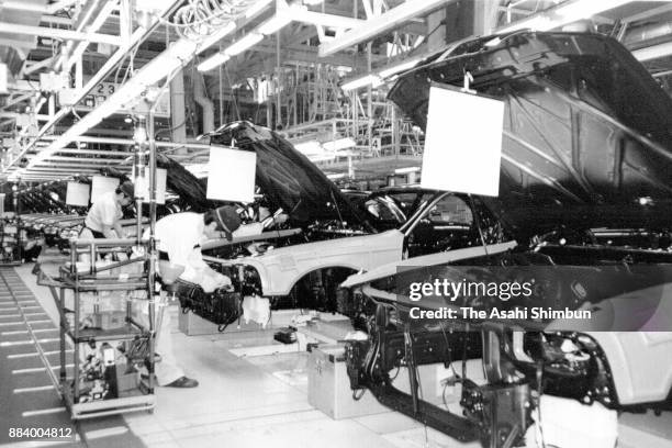 Cars are assembled on the production line at Toyota Motor Co's Tahara Plant on April 13, 1992 in Tahara, Aichi, Japan.