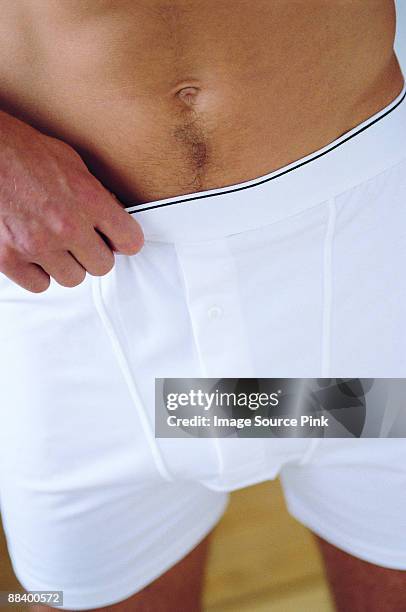 close-up of man wearing boxer-briefs - boxer bildbanksfoton och bilder