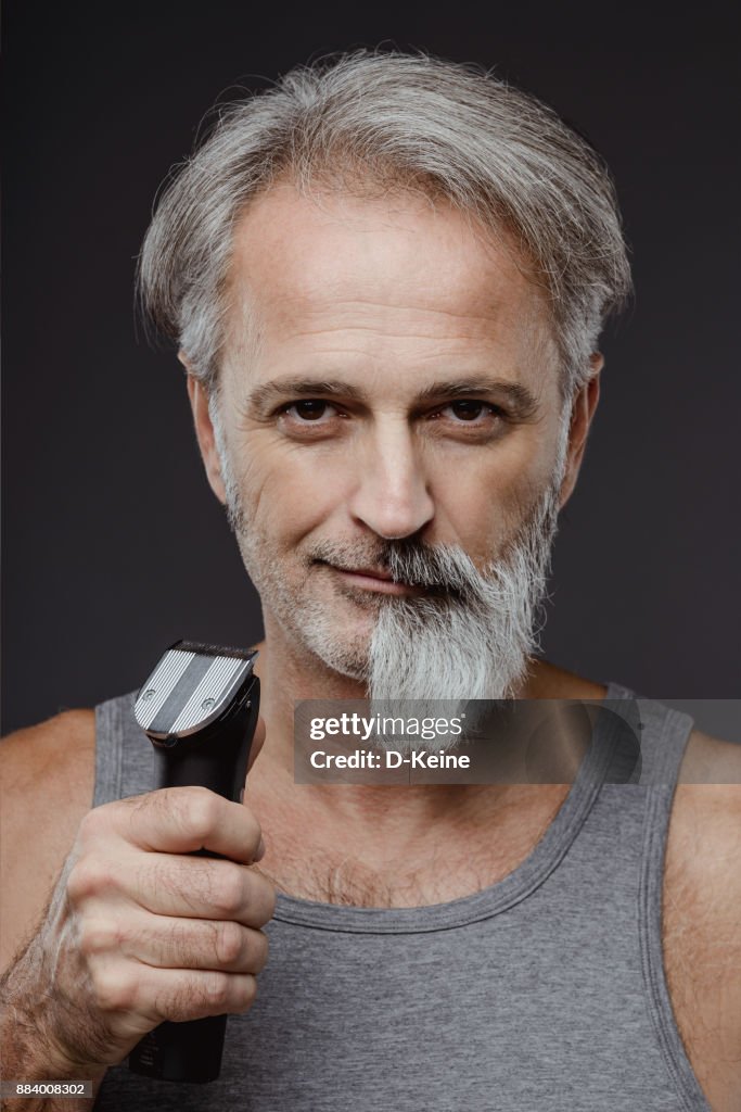 Medio afeitado de la barba