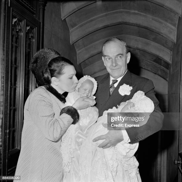 Scottish conservative politician Michael Noble, Baron Glenkinglas with his daughter Marya Anne at the christening of grandchildren Christopher and...