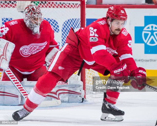 Xavier Ouellet of the Detroit Red Wings defends the front of the net against the New Jersey Devils during an NHL game at Little Caesars Arena on...