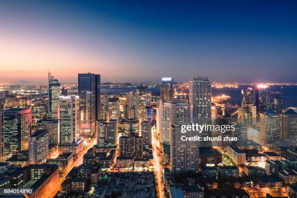 bustling city - dalian stock pictures, royalty-free photos & images